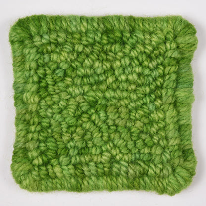 Skein of variegated Leaf Me Alone rug weight punch needle wool yarn