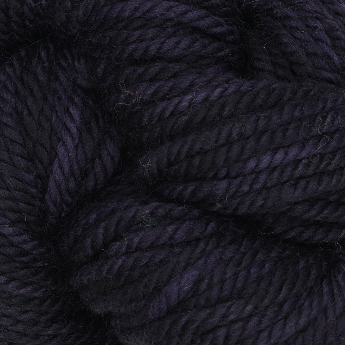 Skein of variegated Blackberry rug weight punch needle wool yarn