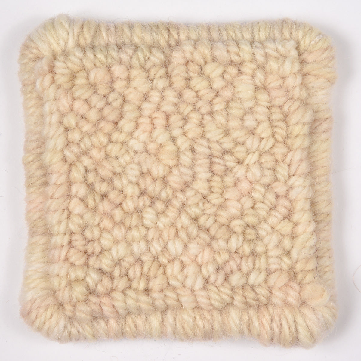 Skein of variegated Caribbean Sands rug weight punch needle wool yarn