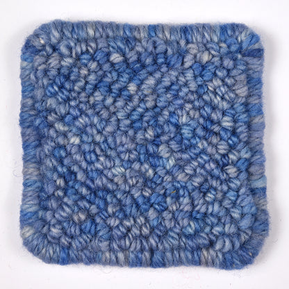 Skein of variegated Lobelia rug weight punch needle wool yarn