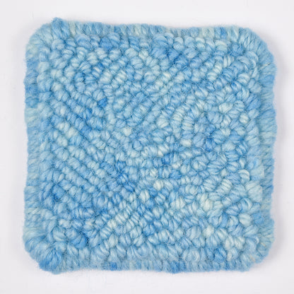 Skein of variegated Open Sky punch needle rug yarn