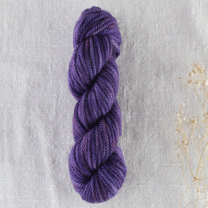 Skein of variegated Purple Reign punch needle rug yarn