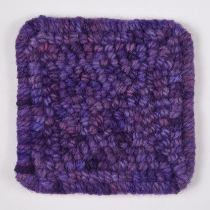 Skein of variegated Purple Reign punch needle rug yarn