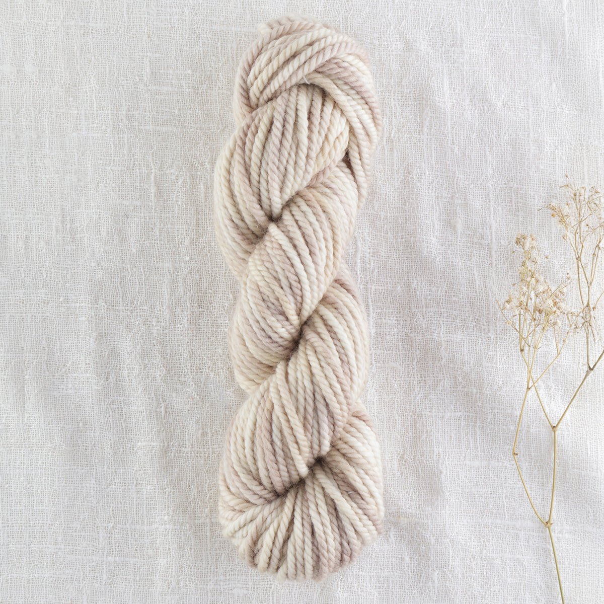 Skein of variegated Smokey Extra Light punch needle rug yarn