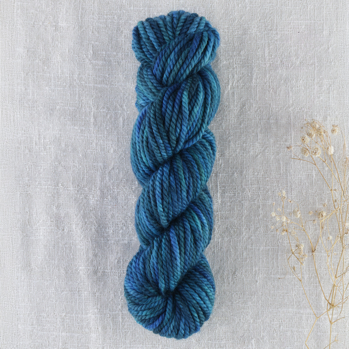 Skein of variegated Summer Day punch needle rug yarn