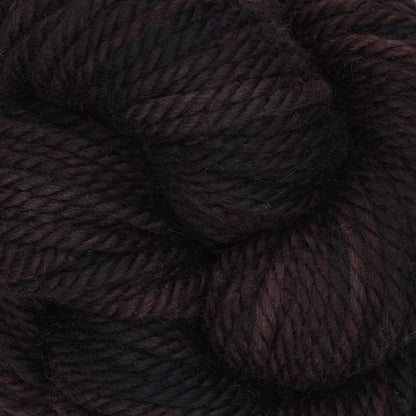 Skein of variegated Black Hollow rug weight punch needle wool yarn