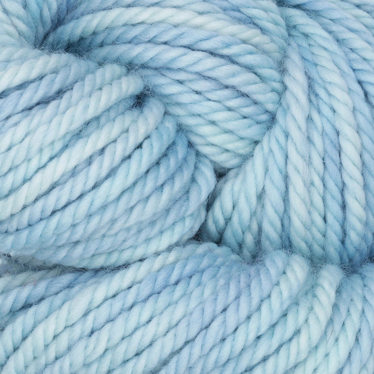 Skein of variegated Eye On The Sky rug weight punch needle wool yarn