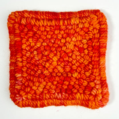 Skein of variegated Scotch Bonnet punch needle rug yarn