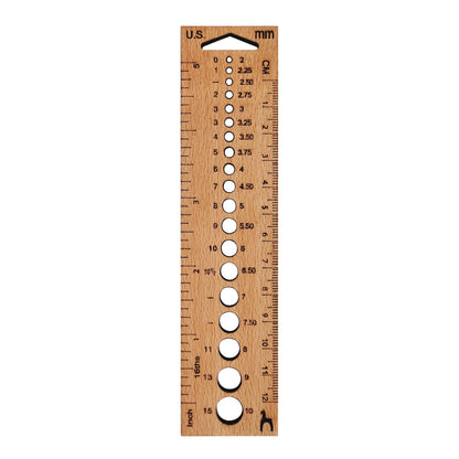 Rectangular wooden knitting gauge with needle holes and ruler markings