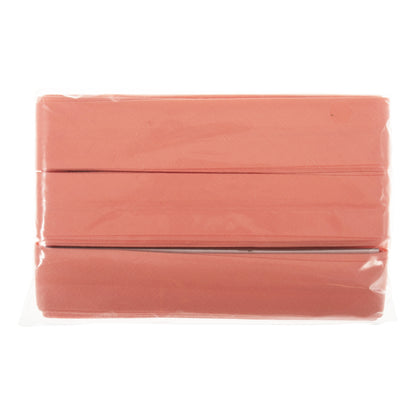Coral polycotton bias binding wound on a card