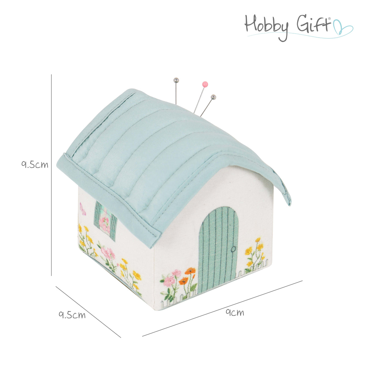 Cottage shaped pincushion with embroidered flowers