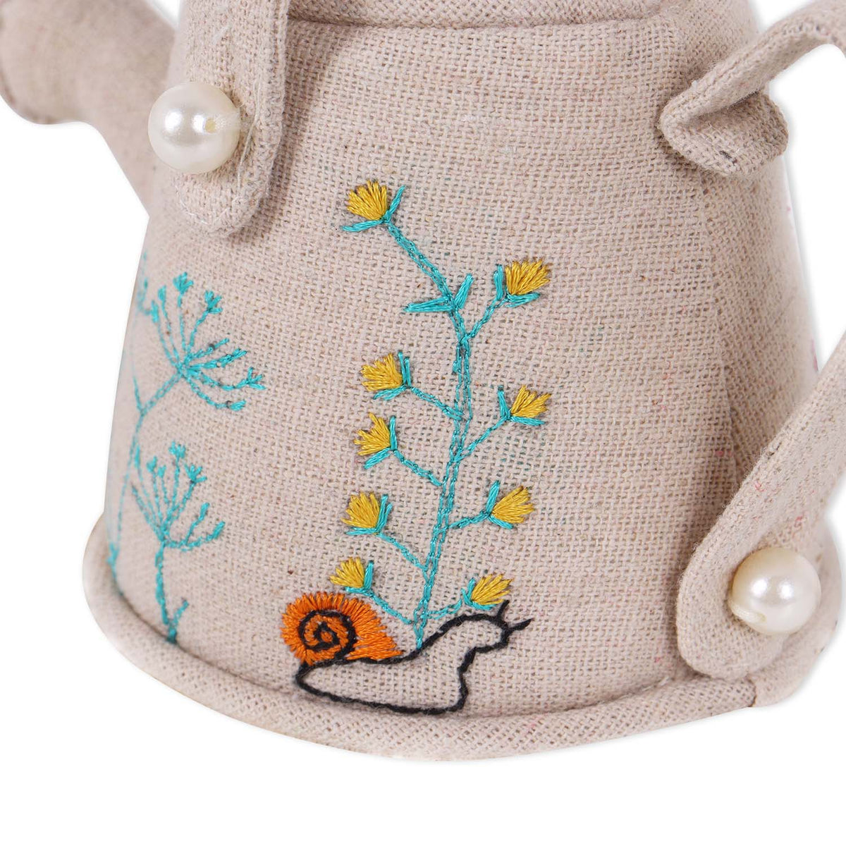 Watering can pincushion with embroidered wildflowers