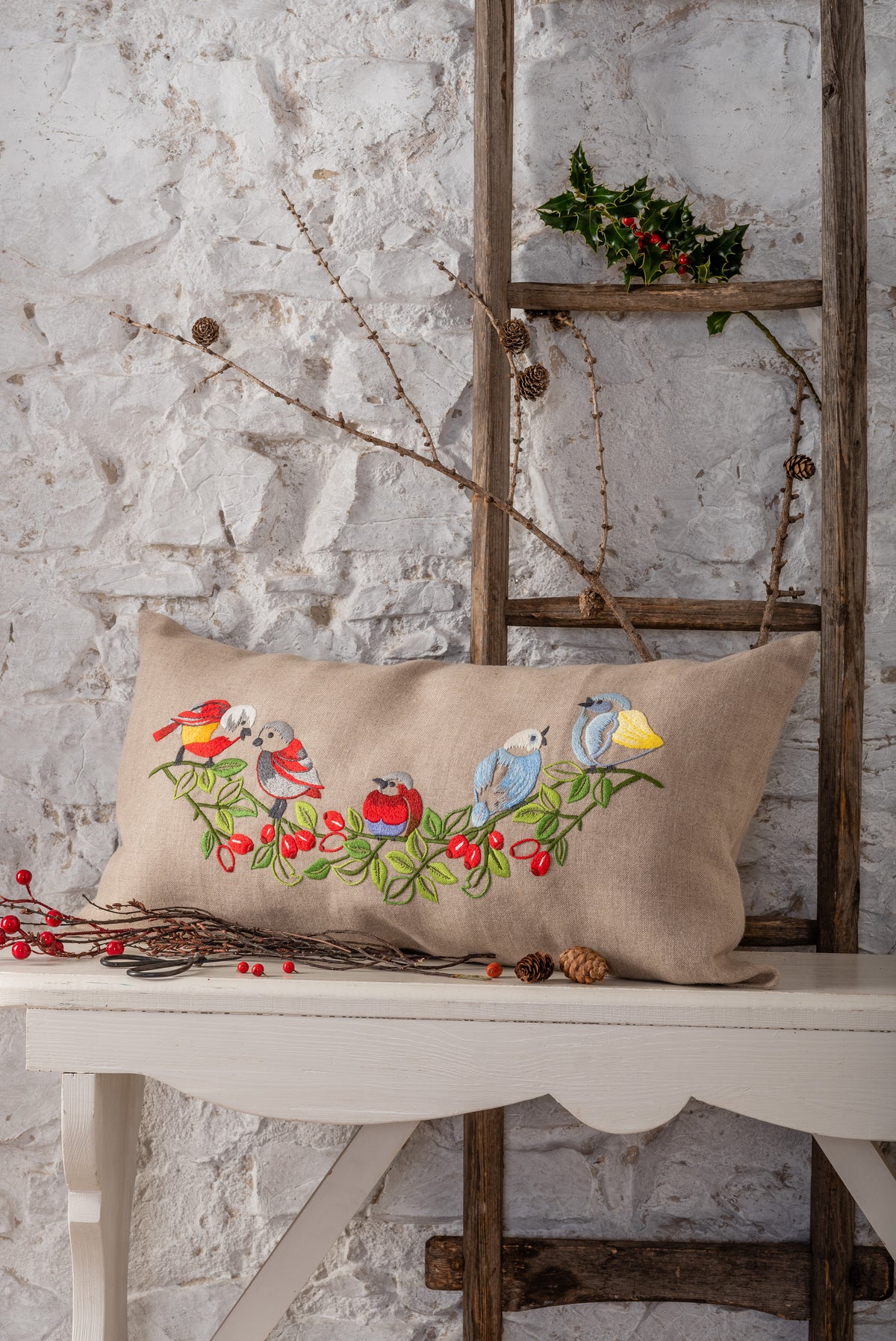 Long embroidered cushion with vintage bird design