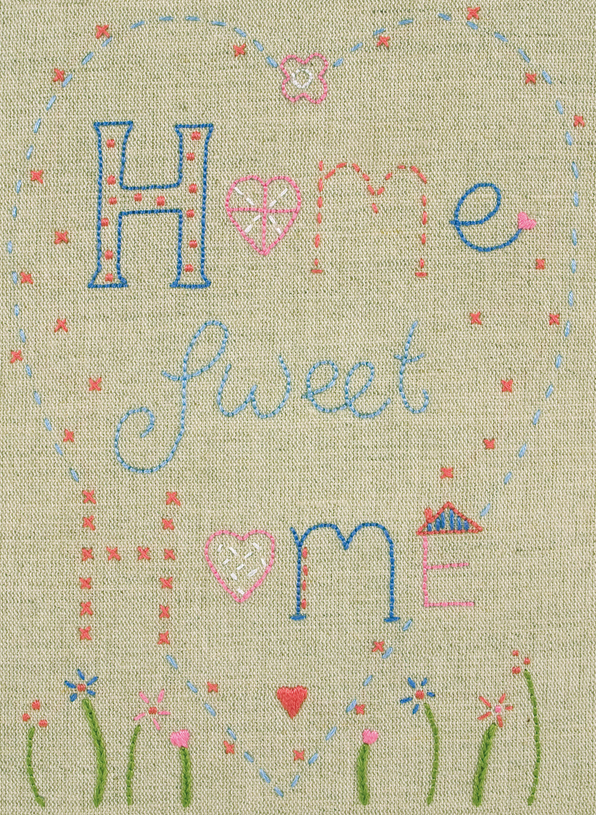 Embroidered Home Sweet Home design on linen