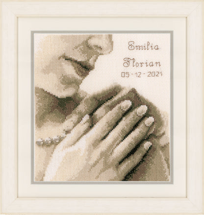 Cross stitch wedding record with joined hands