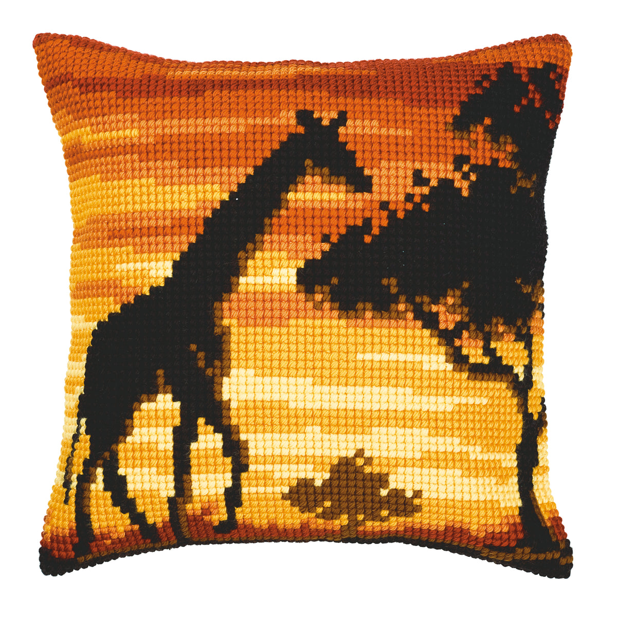 Finished cross stitch cushion showing a giraffe at sunset