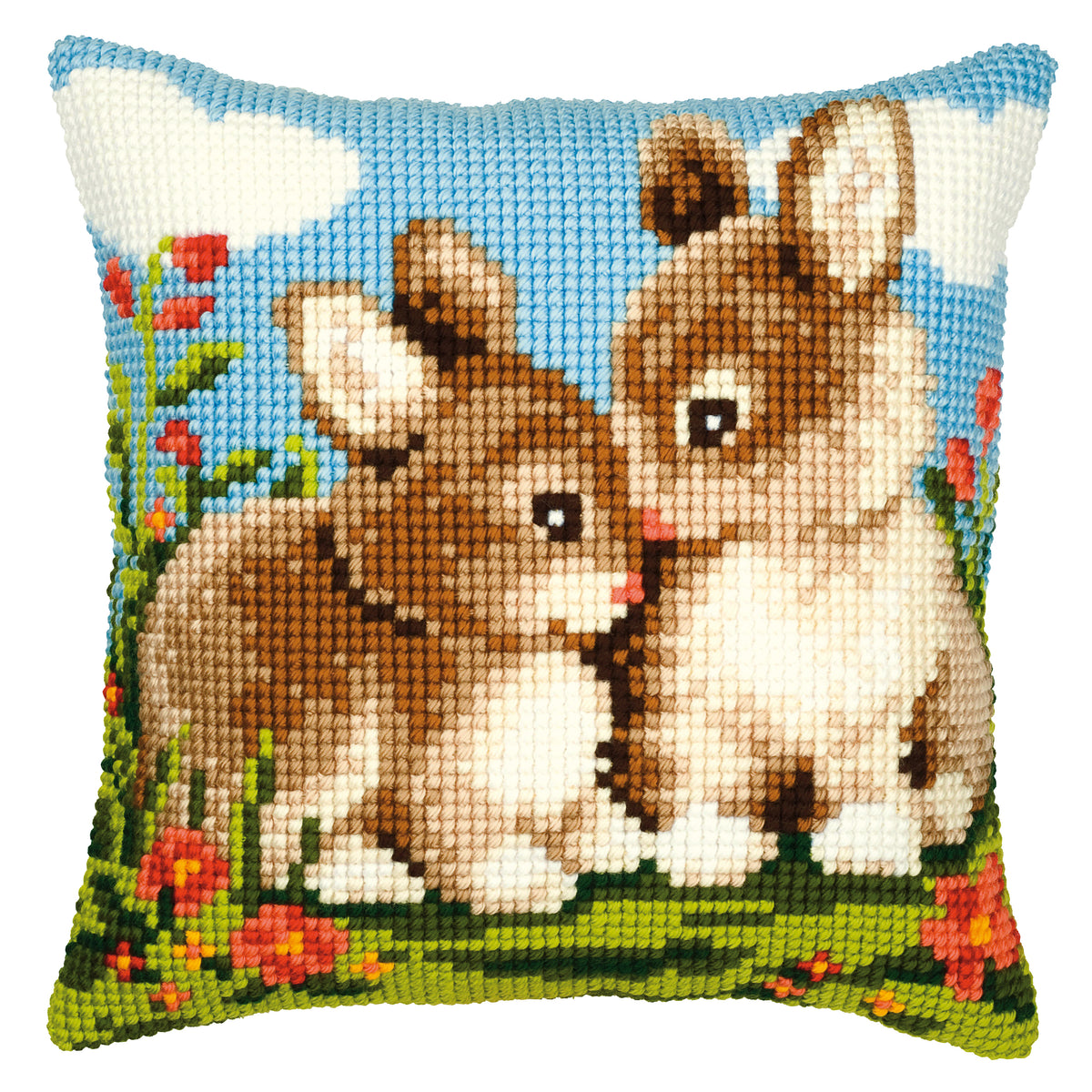 Finished cross stitch cushion showing rabbits
