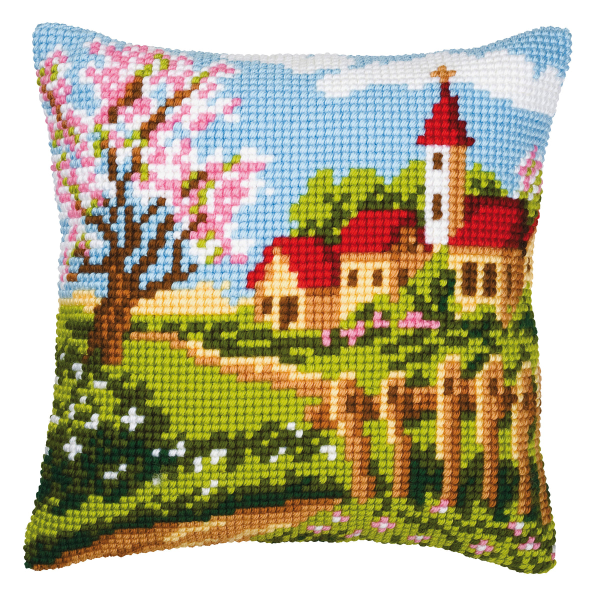 Finished cross stitch cushion showing a country church