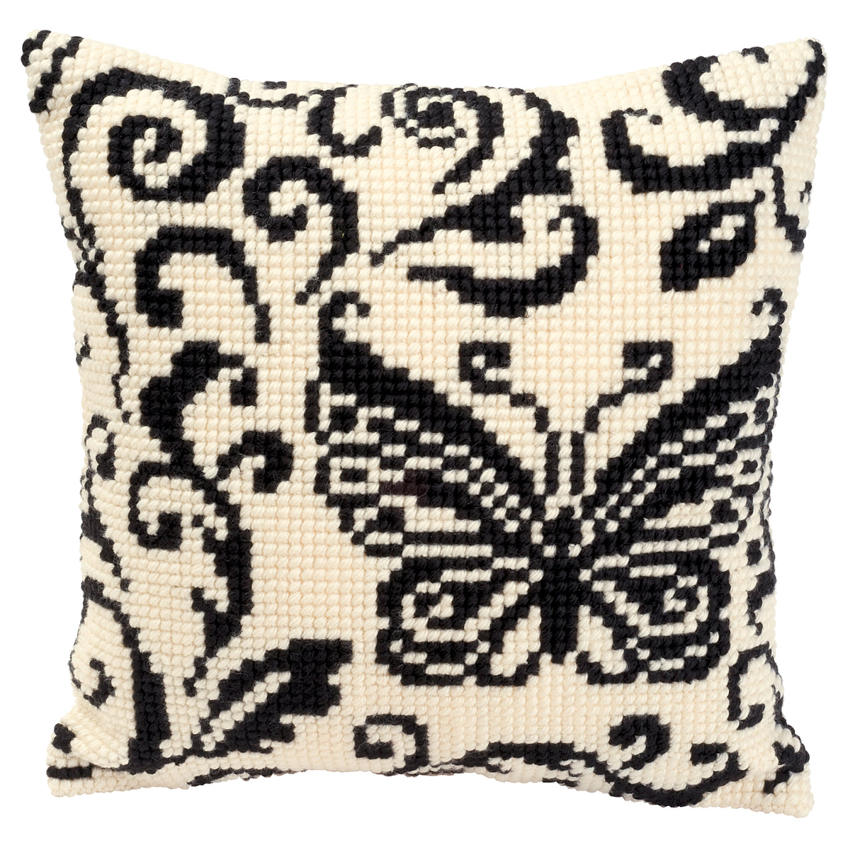 Finished cross stitch cushion showing a black butterfly and swirls on cream
