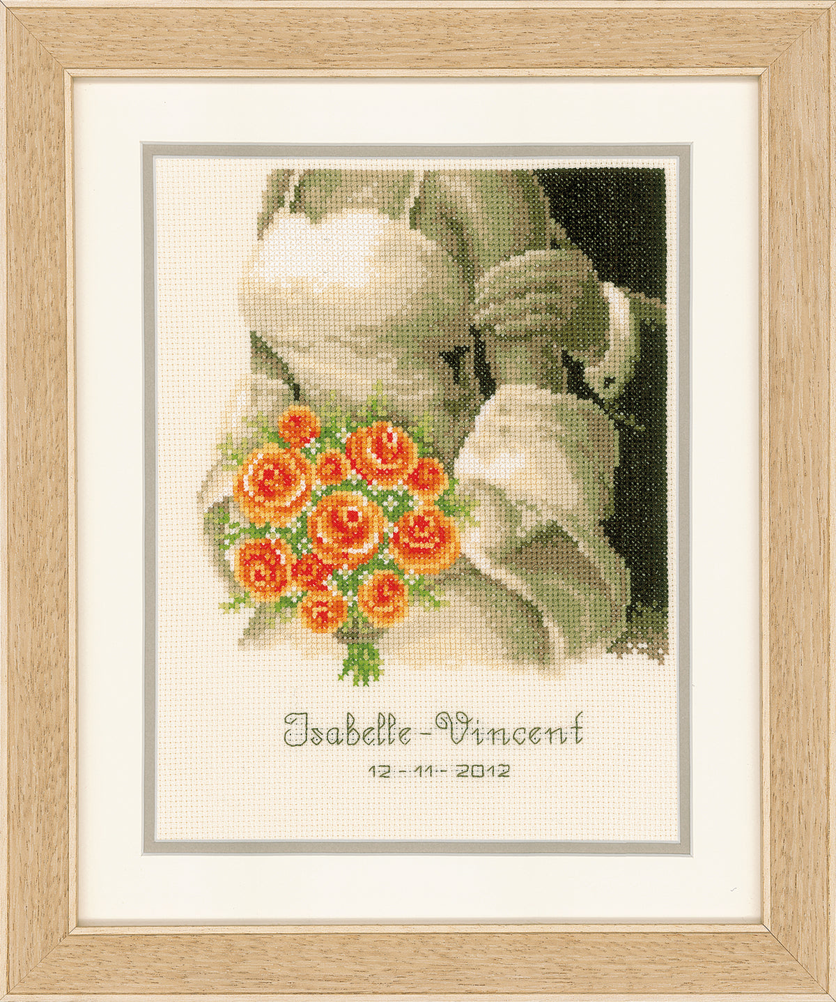 Finished wedding record cross stitch with a bouquet design