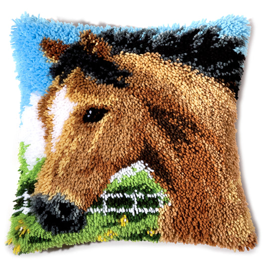 Finished Vervaco latch hook cushion with a horse design