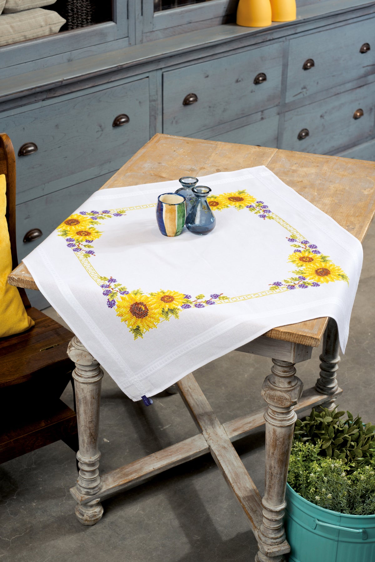 White square tablecloth embroidered with sunflowers