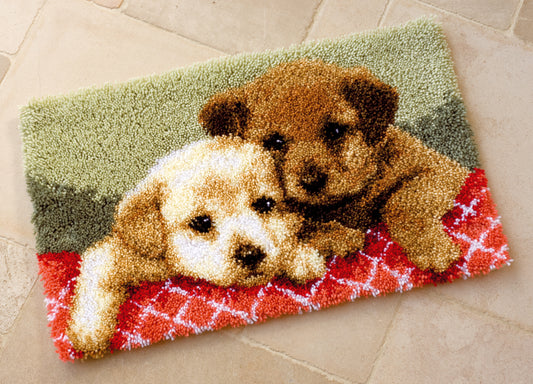 Finished Vervaco latch hook rug showing a puppies design