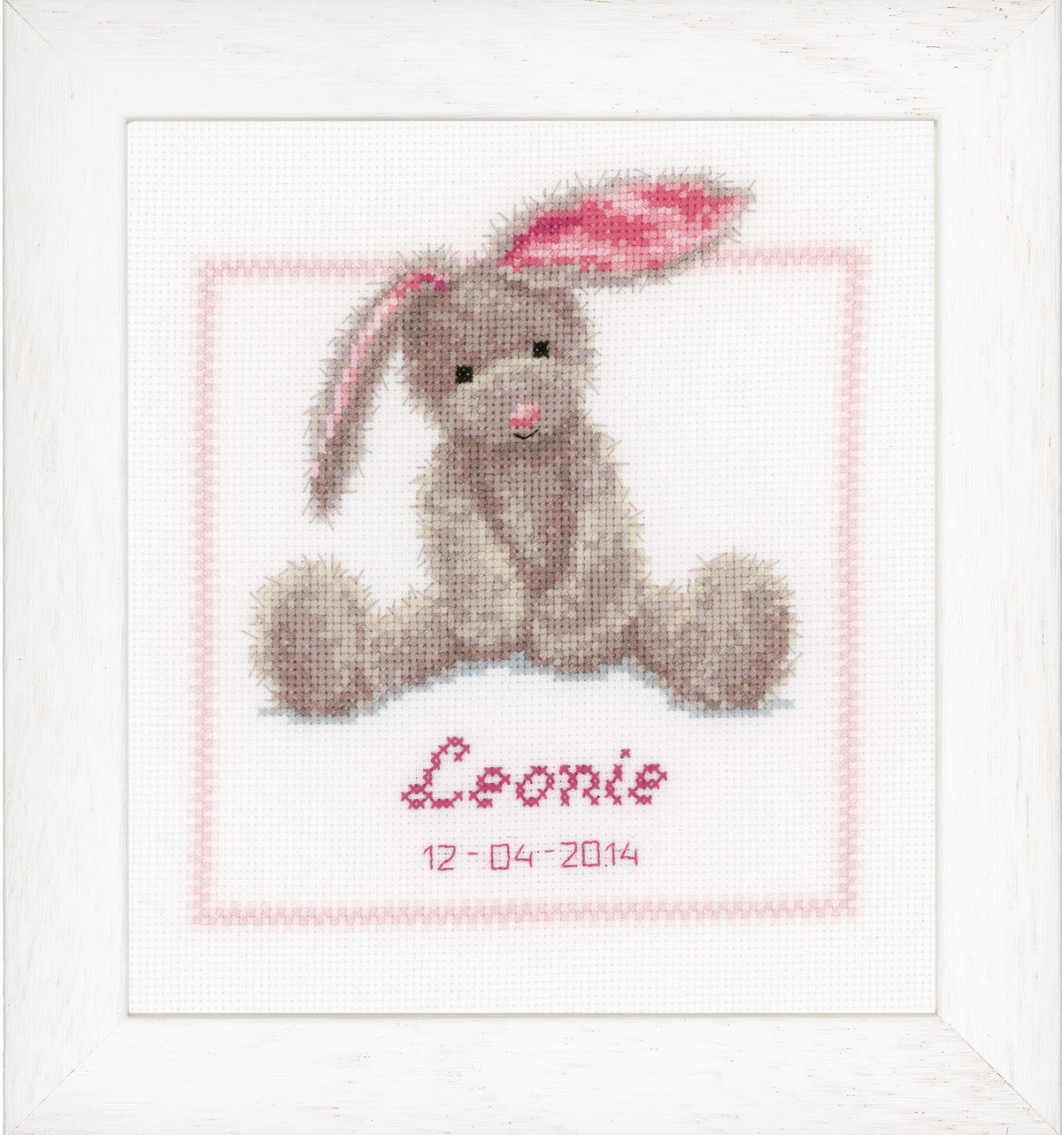 Cross stitched picture of a cute bunny