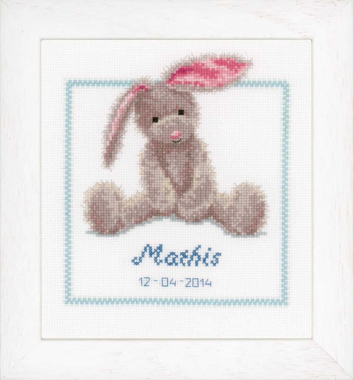 Cross stitched picture of a cute bunny