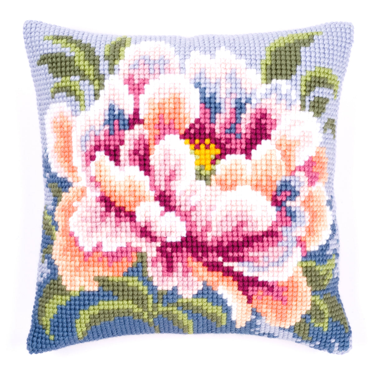 Finished Vervaco cross stitch cushion showing a large pink peony on a blue background