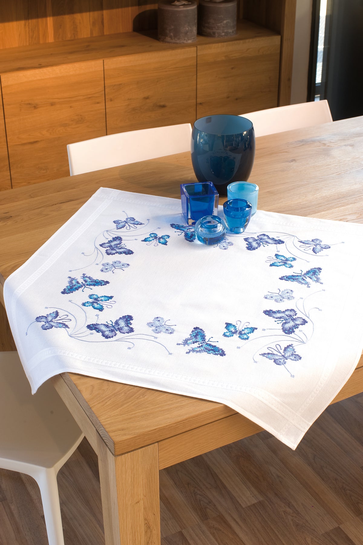 Embroidered tablecloth with blue butterflies