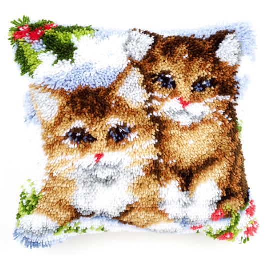 Finished Vervaco latch hook cushion showing cats in the snow