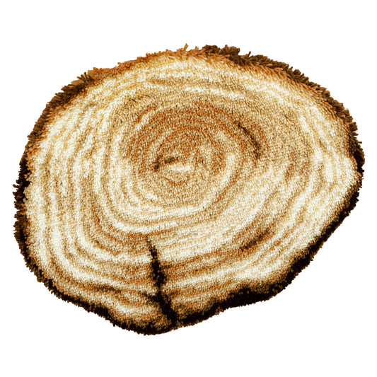 Latch hook shaped rug showing a tree stump