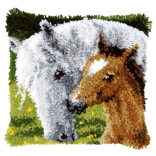 Latch hook cushion showing a horse and foal
