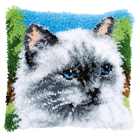 Latch hook cushion showing a fluffy ragdoll cat