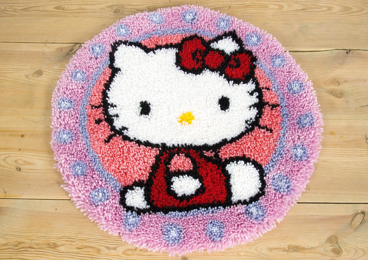 Round Vervaco latch hook rug with a Hello Kitty design