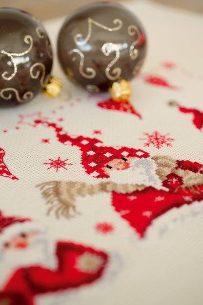 Cross stitch picture of cheerful Father Christmas figures