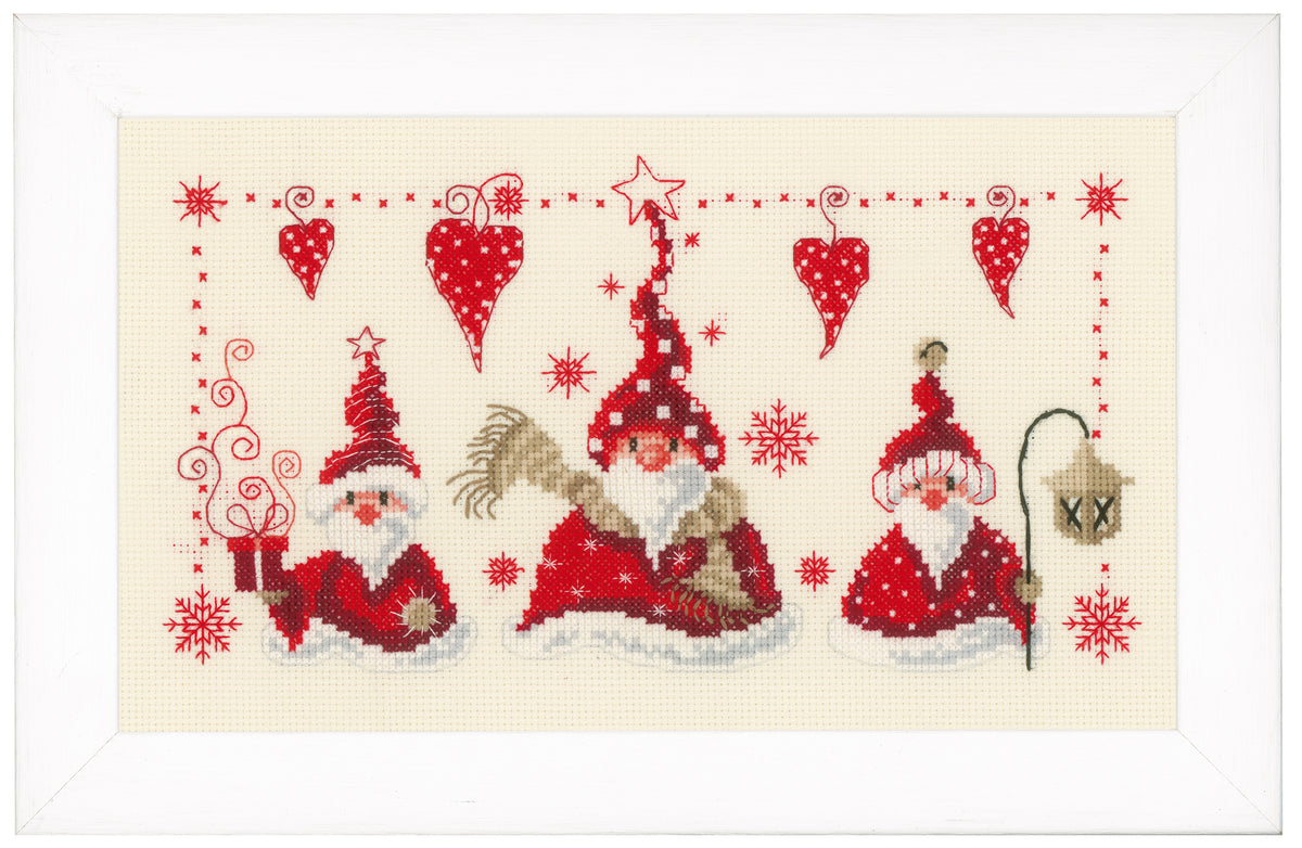 Cross stitch picture of cheerful Father Christmas figures