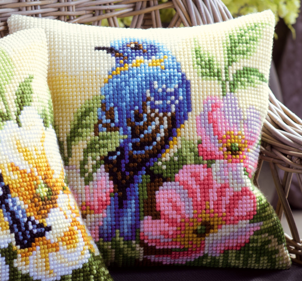 Vervaco cross stitch cushion showing a bird perched on a rose bush