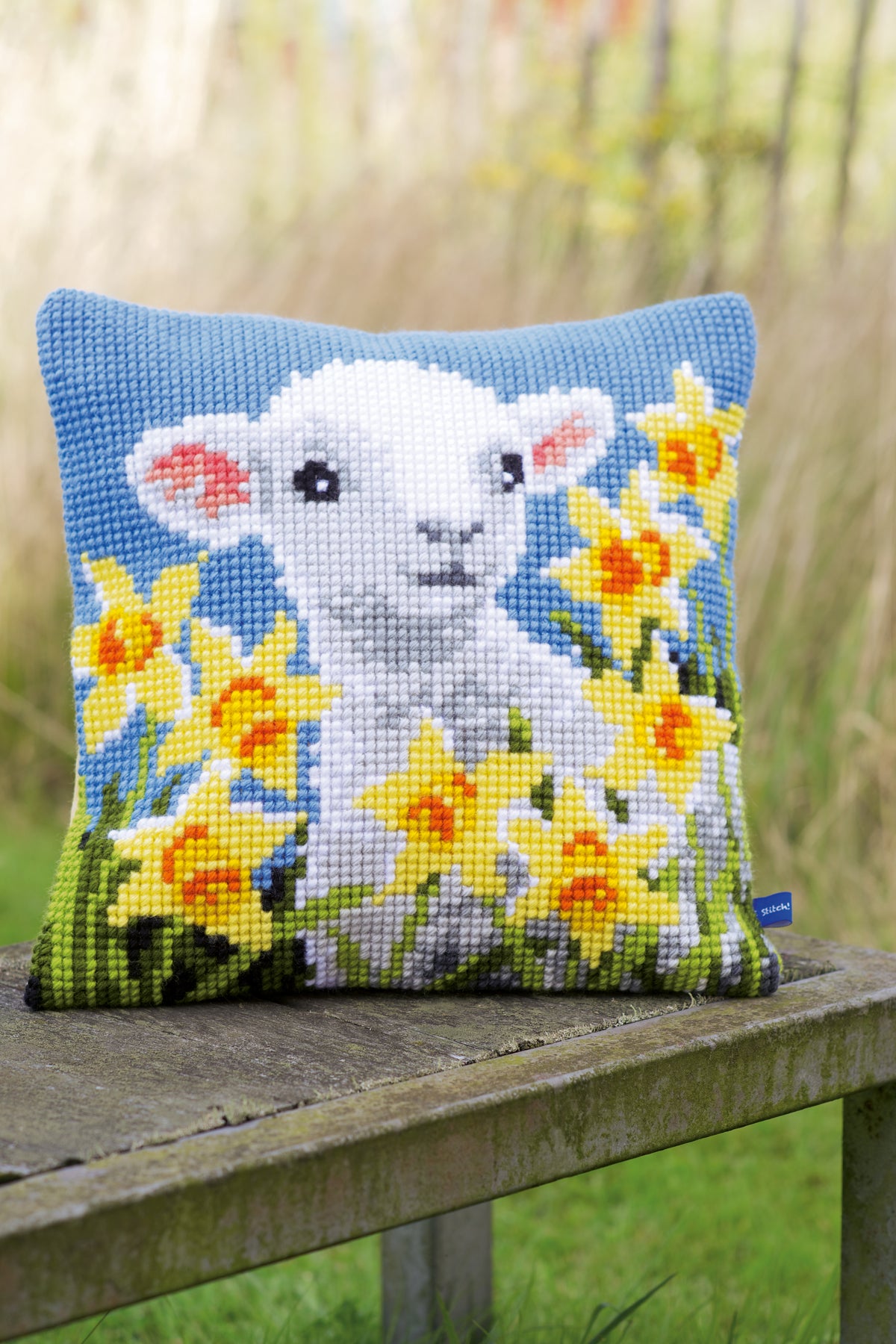 Cross stitch cushion kit with a lamb design