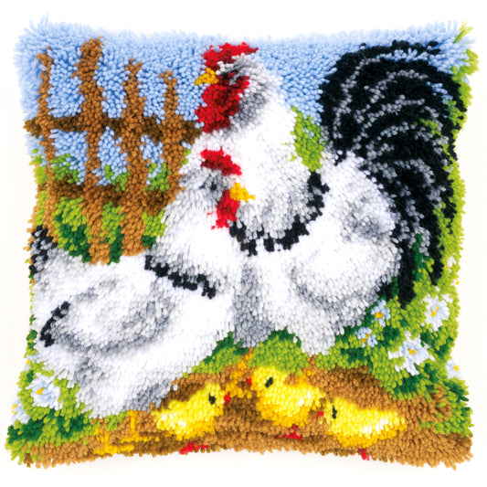 Latch hook cushion kit with a chicken family on a farm