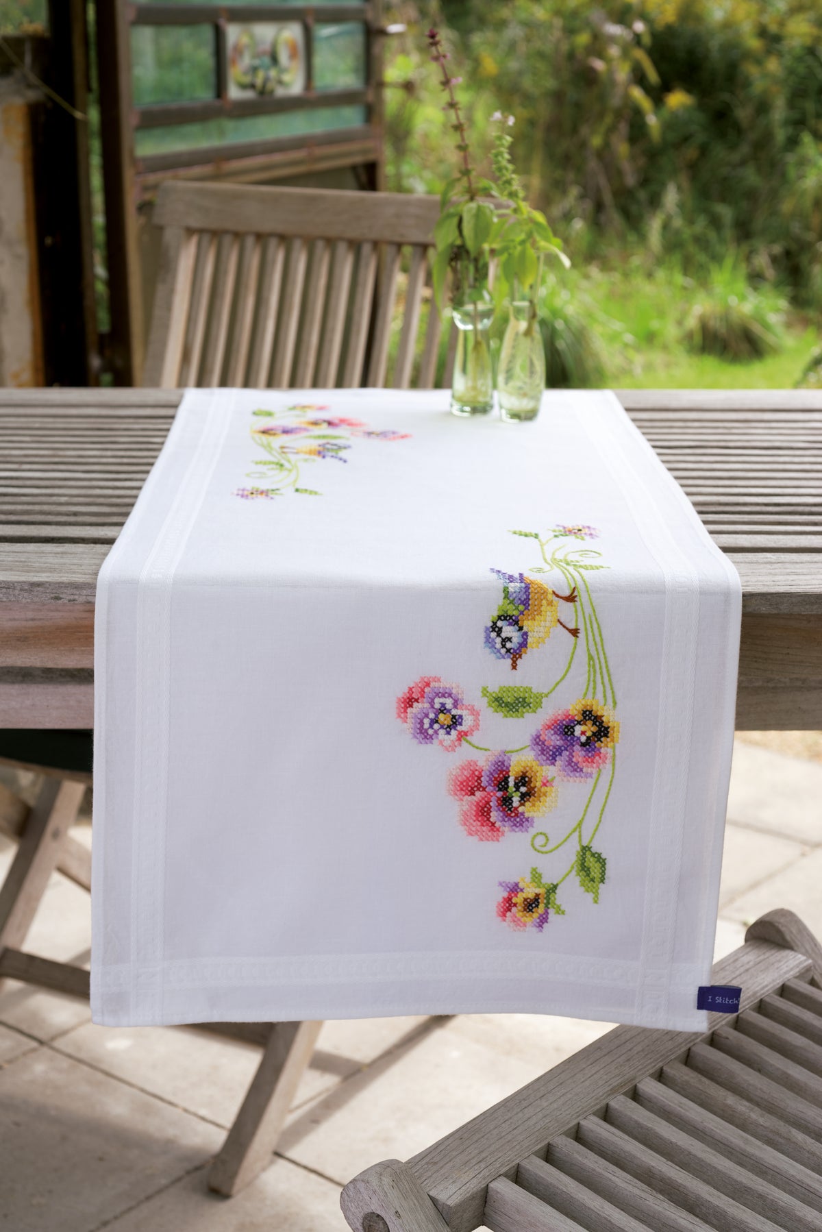 Printed embroidery table runner kit with birds and pansies