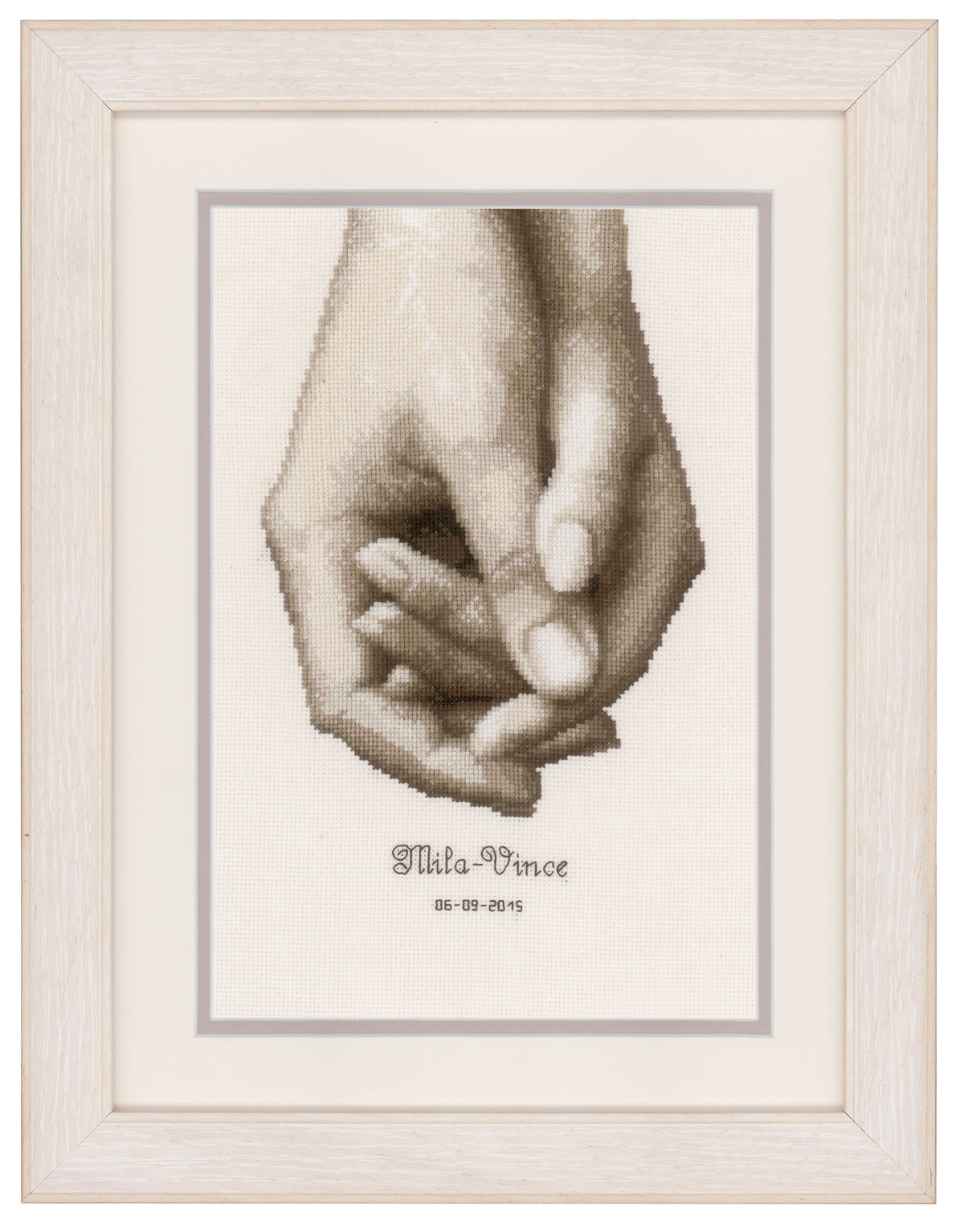 Counted cross stitch kit with a hand in hand design