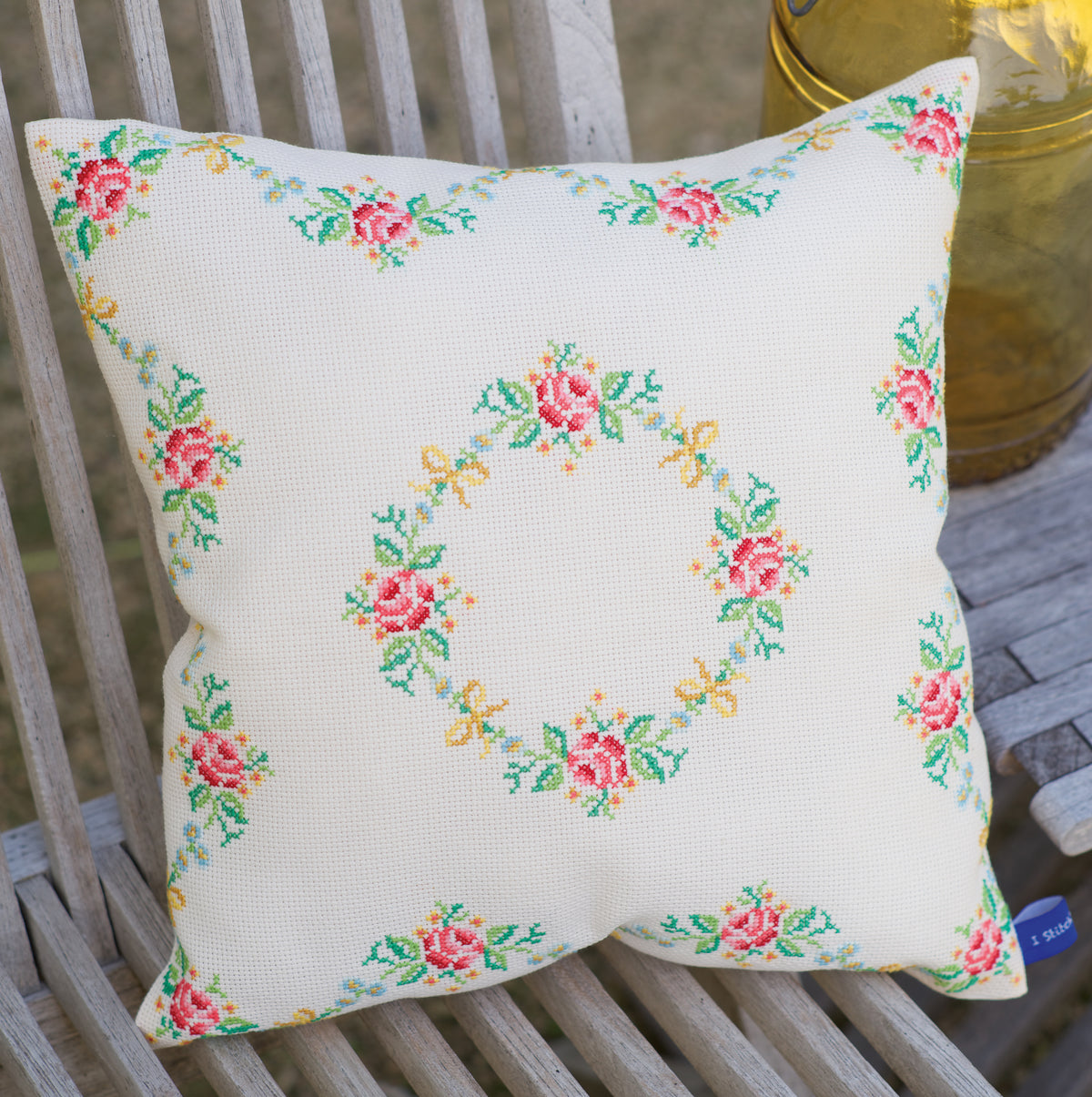 Finished garland and roses cushion cross stitch design