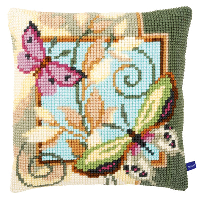 Cross stitch cushion with decorative butterflies