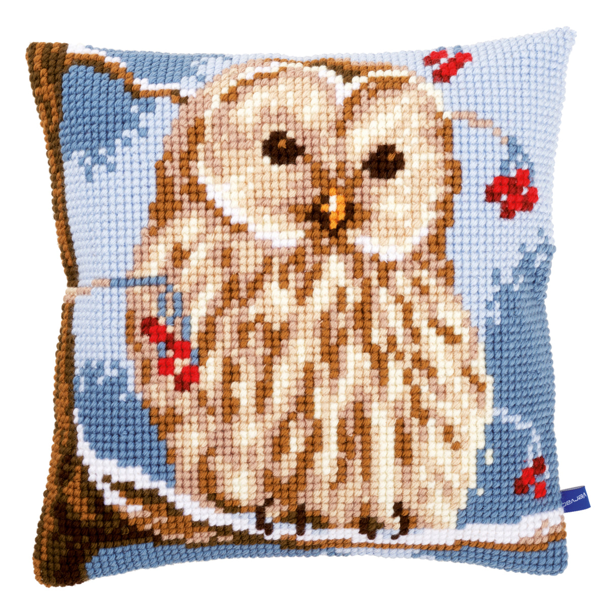 Cross stitch cushion with a winter owl