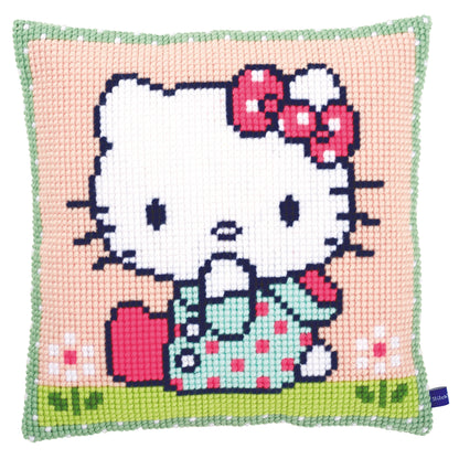 Hello Kitty cross stitch cushion with Kitty on a green lawn