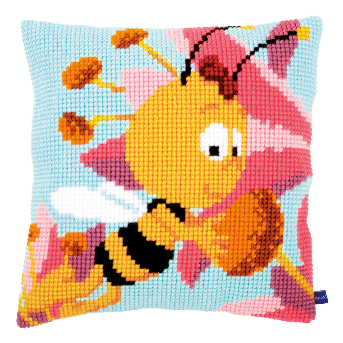 Cross stitch cushion showing Willy holding a pink flower