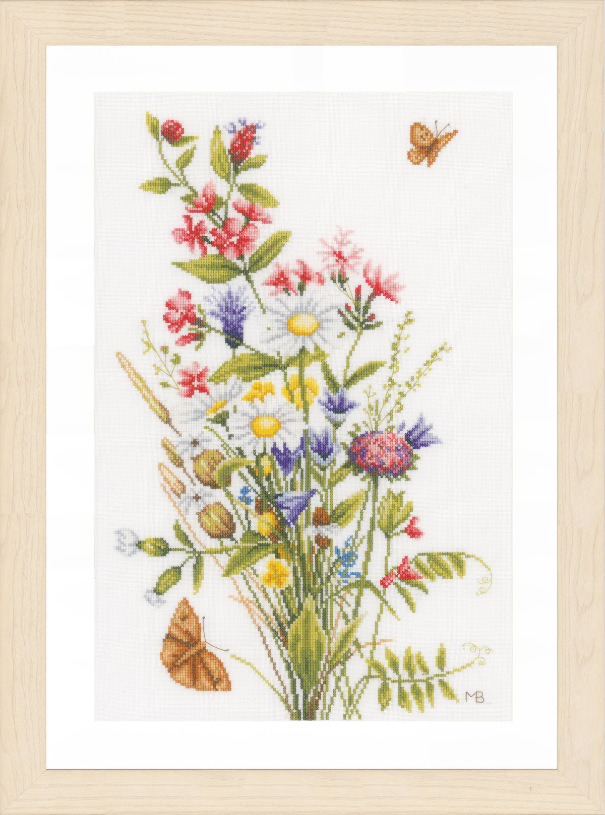 Cross stitch picture of field flowers on white evenweave