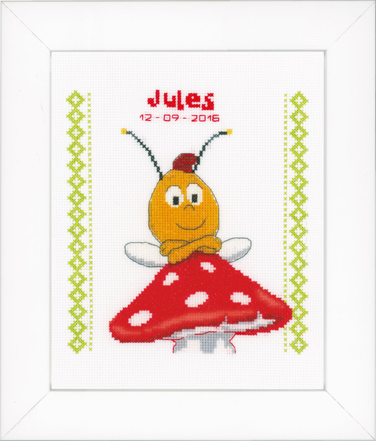 Cross stitch birth record with Willy sitting on a mushroom